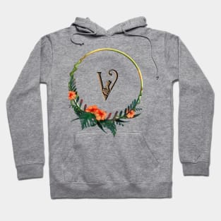 Circle frame with tropical flowers and girl figure around letter V Hoodie